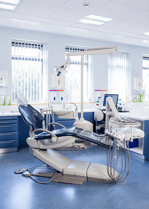 Happy patient in dental chair